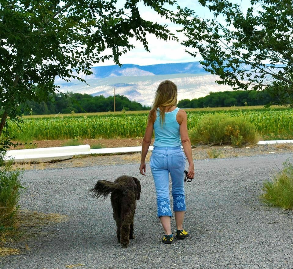 Sandie Lynn walking a dog